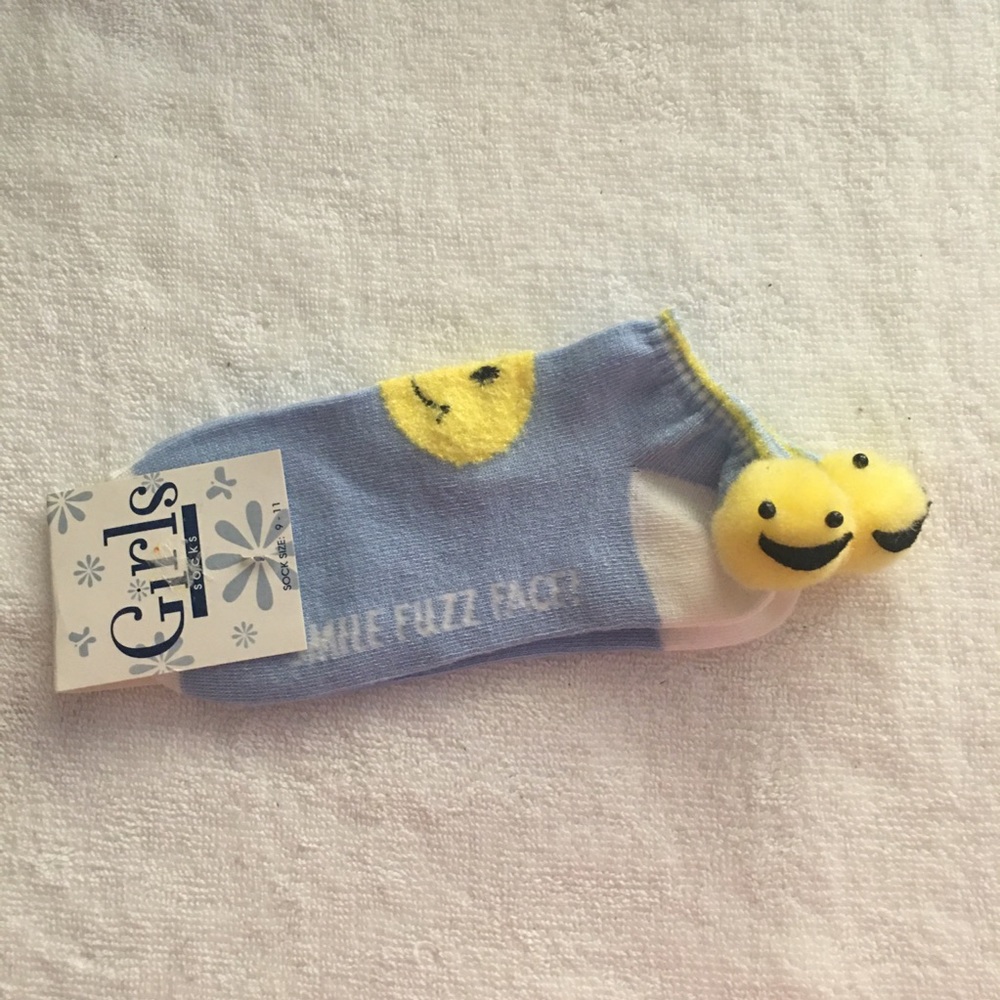 NWT smile fuzz ball socks